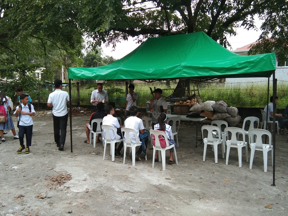 events: tent outreach at F. Nepomuceno memorial high school